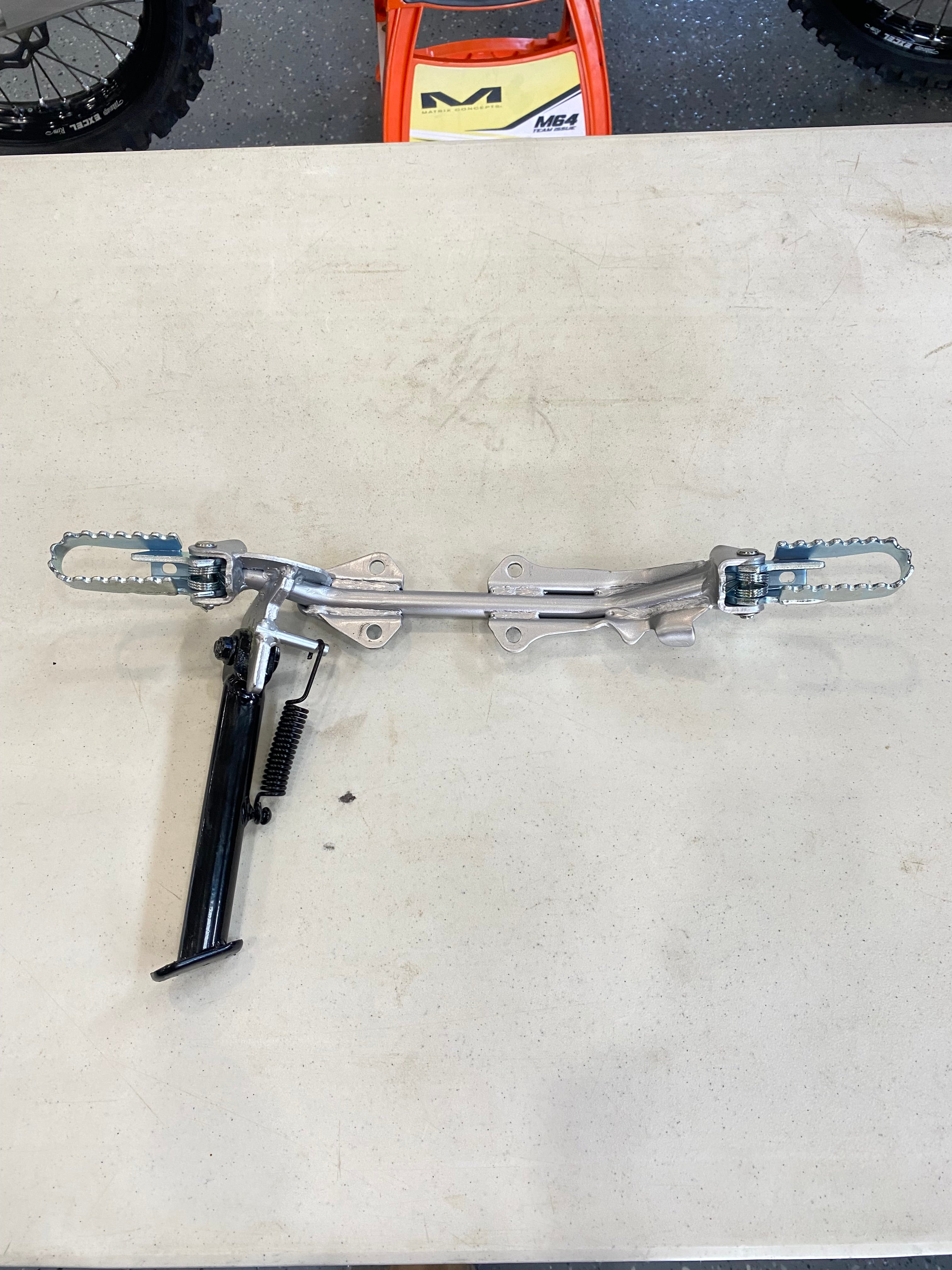 crf110 OEM foot peg assembly